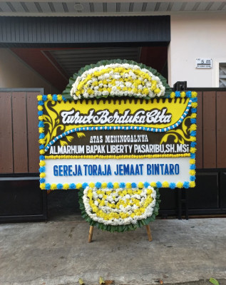 Papan Bunga Duka di Pengadang